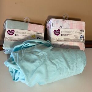 Crib and play yard sheets set of 5 plus one loose one new unused